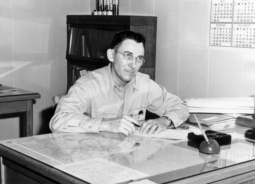 Esmond Edward Hennesy at his desk at International Paper