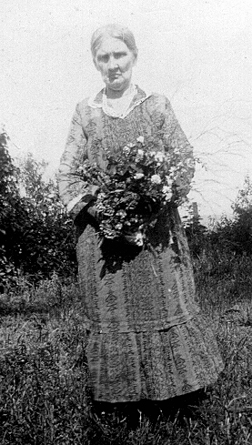 Photo of Delana Fowler Brewer with Flowers